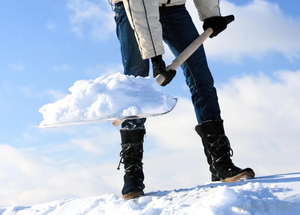 Photo of person shovelling snow Photo of person shovelling snow